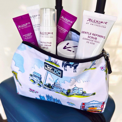 Alchimie Forever x Scout Limited Edition Beauty Bag.  White background with iconic Washington, DC landmarks.